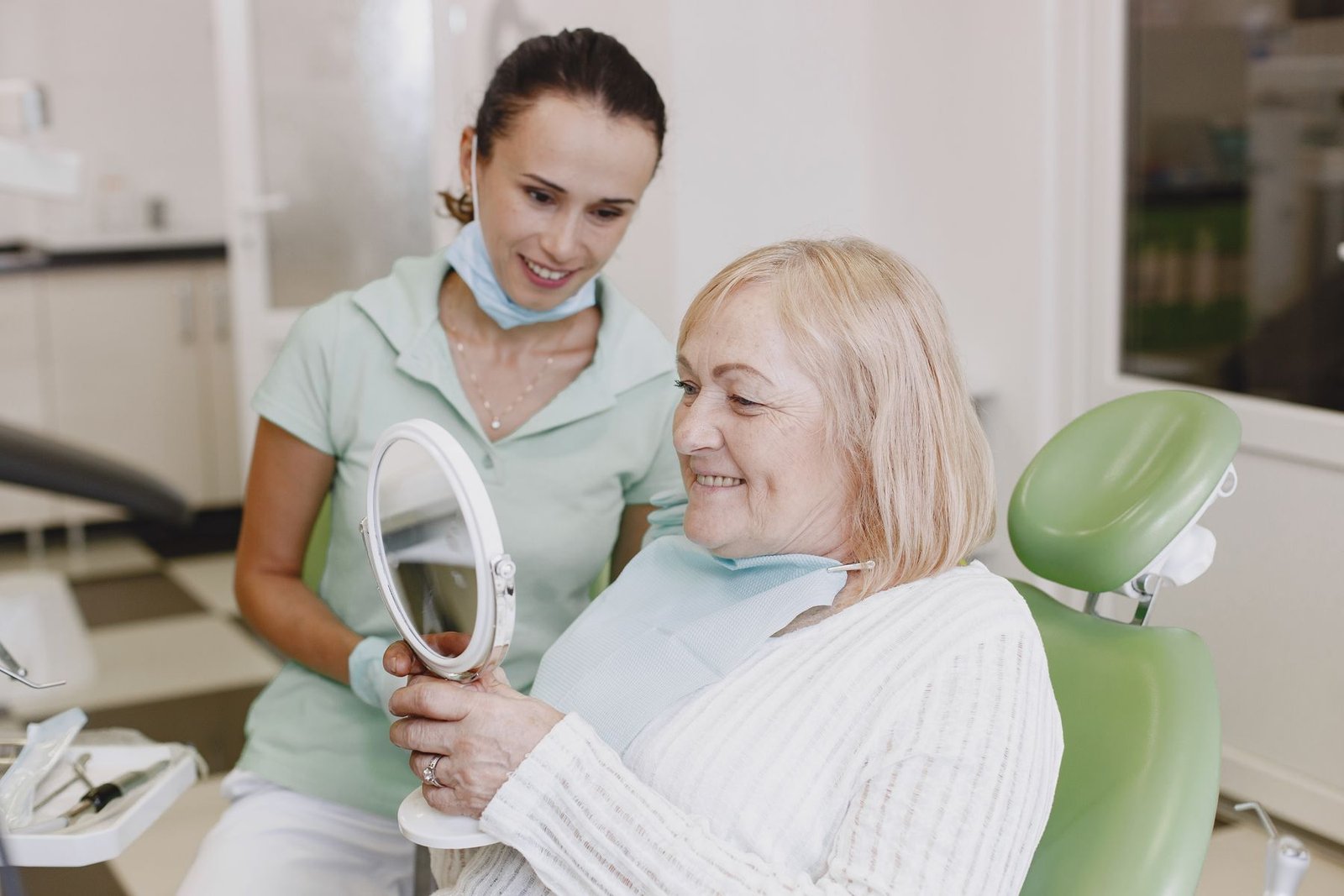 Patient smiling naturally after a dental consultation